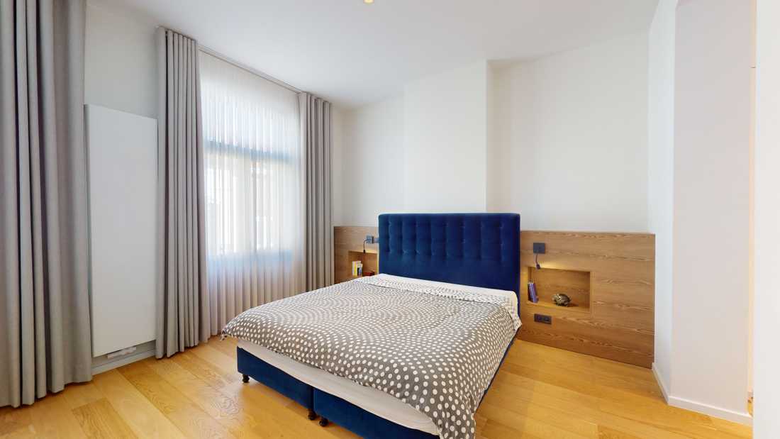 Chambre après les travaux de rénovation coordonnés par un architecte d'intérieur