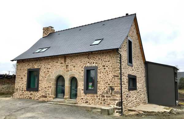 Extension d'une ancienne maison en pierre en région Bruxelles-Capitale