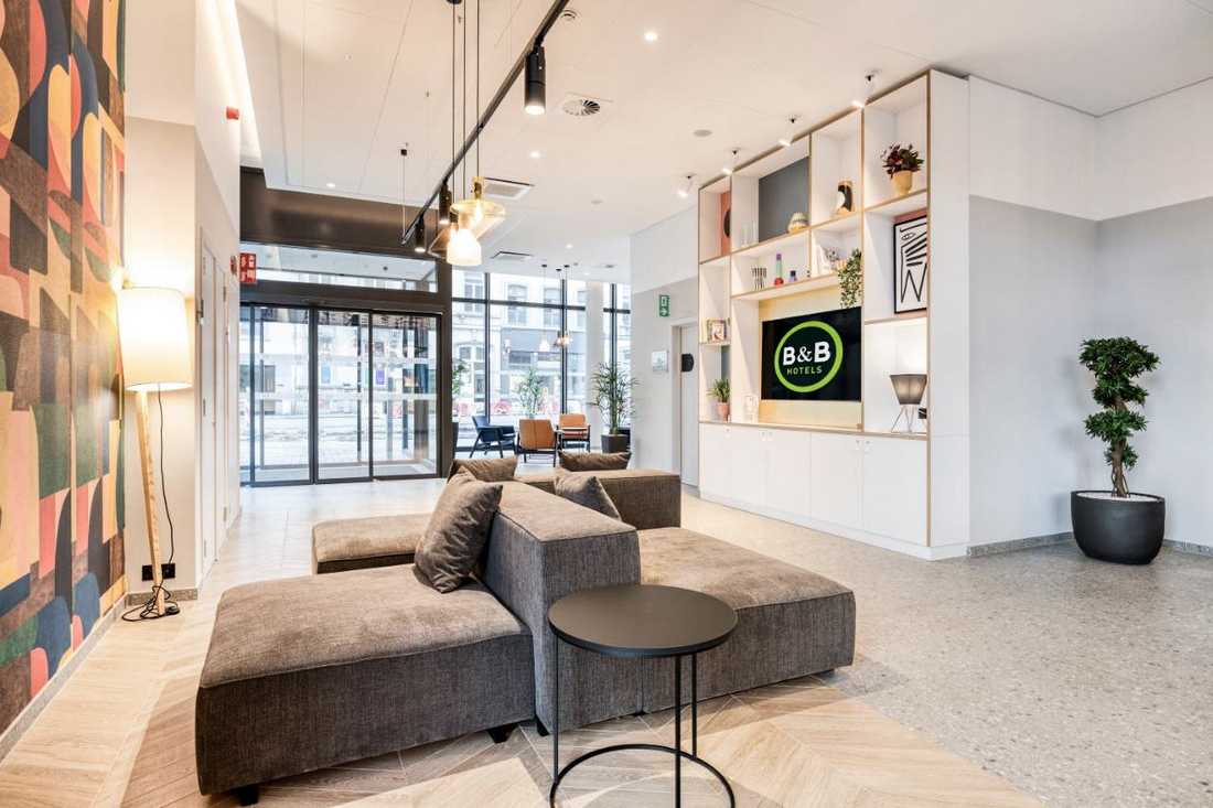Lobby d'un hôtel à Namur aménagé par un architecte d'intérieur