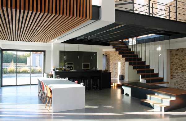 Réhabilitation d'un bâtiment agricole en habitation par un architecte d'intérieur à Bruxelles