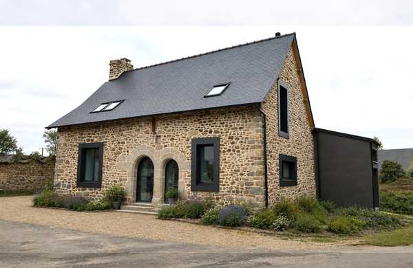 Extension d'une ancienne maison en pierre en région Bruxelles-Capitale