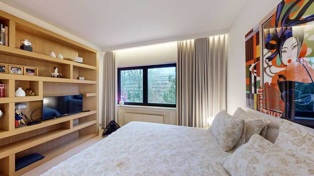 Chambre avec rangements conçus sur mesure par un architecte d'intérieur